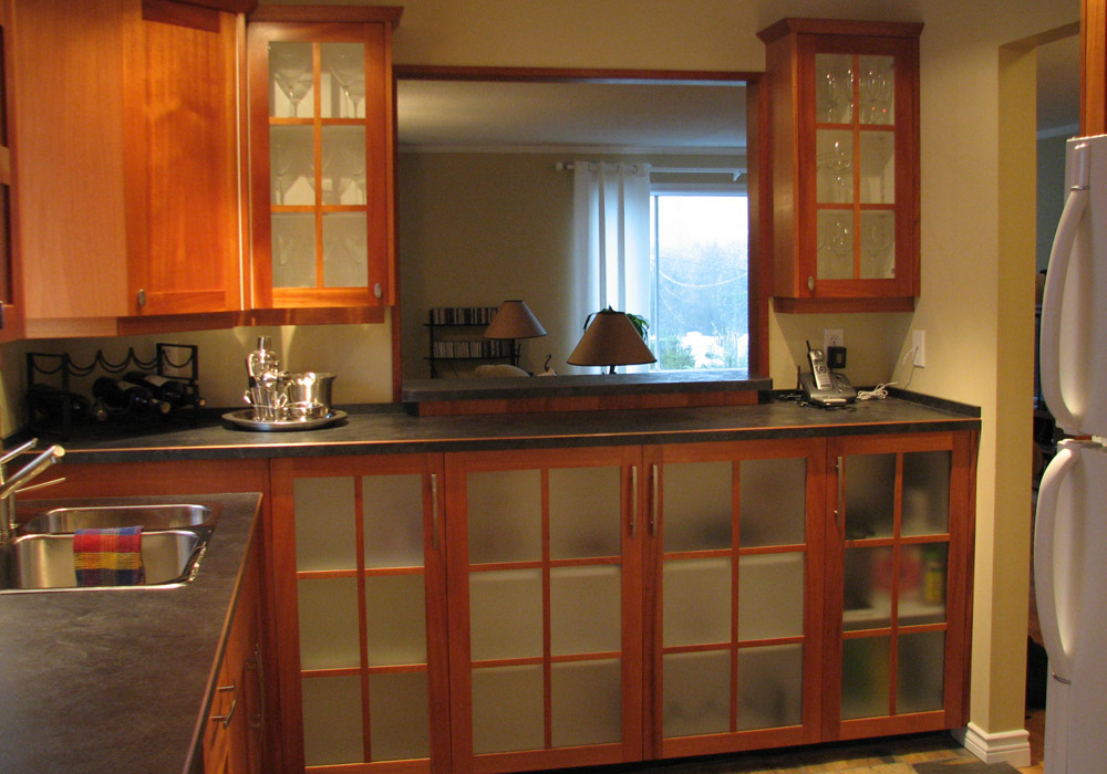 Wide built-in storage wall with long-span cherry shelving