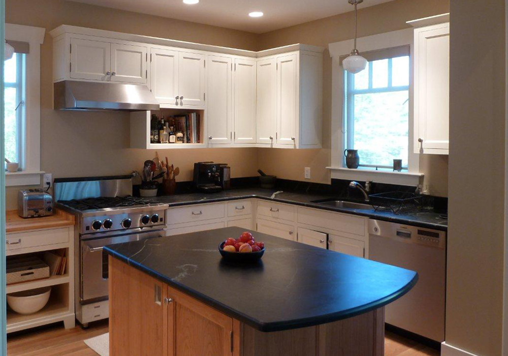 Classic face-frame kitchen painted with cherry wood island.