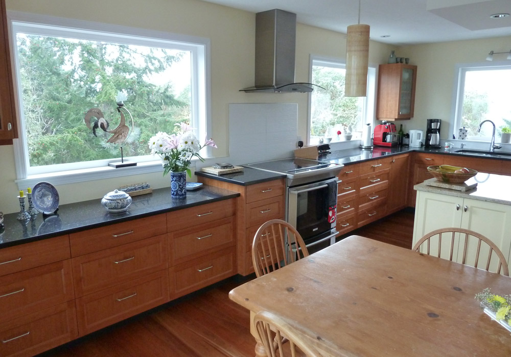 Quarter cut cherry shaker doors with soapstone counters.  Painted island.